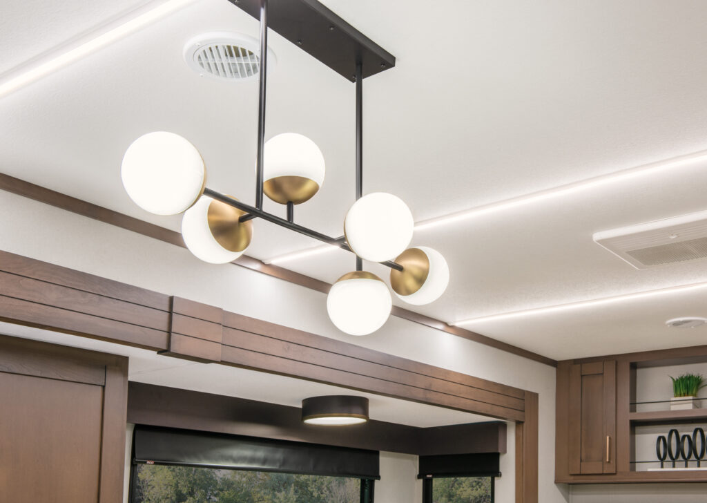 Interior lighting in the 2025 Heartland RV Bighorn 391MFB Fifth Wheel living room.