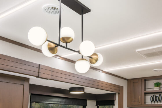 Interior lighting in the 2025 Heartland RV Bighorn 391MFB Fifth Wheel living room.