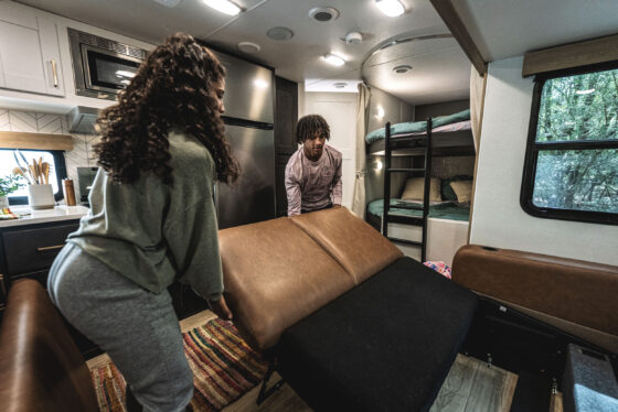 Interior view of a Heartland RV, showcasing the living area and kitchen.