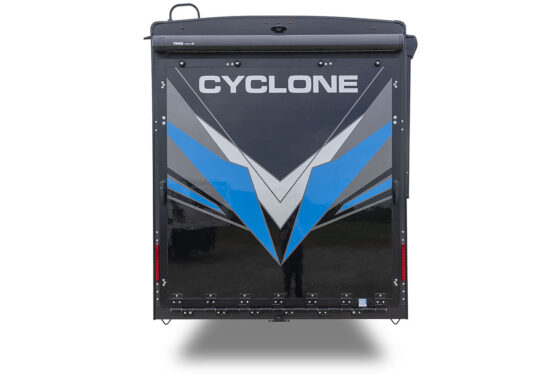 Rear view of a 2024 Heartland Cyclone toy hauler fifth wheel with a sleek exterior paint design.
