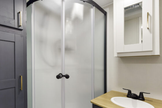 Interior view of the bathroom area in a 2024 Mallard MA 210RB travel trailer by Heartland RVs.