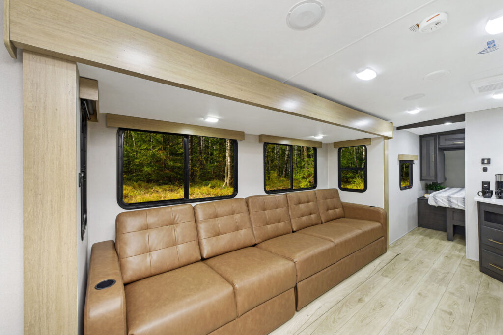 A spacious and modern living area inside a Heartland RV North Trail 29BHP model.