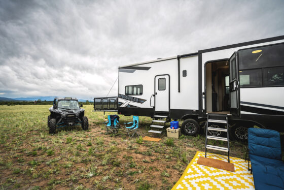 Side view of the 2025 Heartland Torque fifth wheel RV, featuring a sleek design and a spacious, durable exterior.