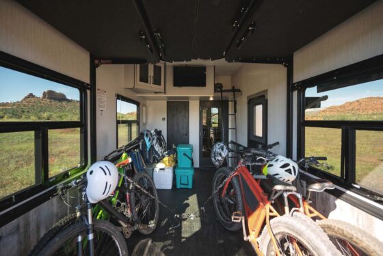 Spacious garage area inside the 2025 Heartland Cyclone Fifth Wheel, designed for storing outdoor gear and off-road vehicles.