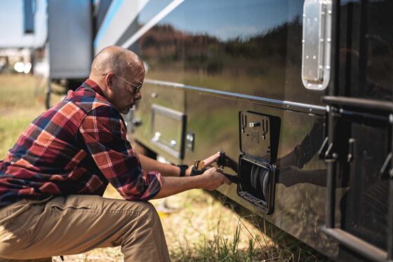 Close-up of the exterior of a Cyclone RV showcasing its sleek design and durable construction.