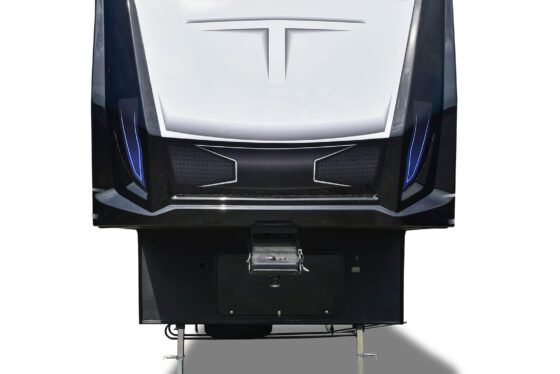 Front view of the Heartland Torque fifth wheel RV, showcasing its bold front cap and aerodynamic design.