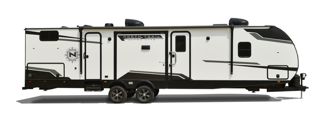 Exterior view of the 2024 Heartland NT 24 RV, featuring a sleek design, large windows, and modern graphics.