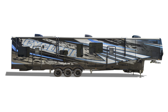 Exterior side profile of a Heartland Cyclone toy hauler, featuring bold graphics, multiple slide-outs, and a spacious garage.