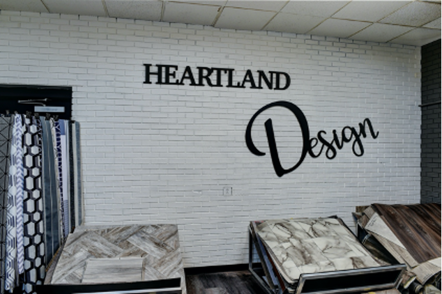 Flooring and fabric samples for RV interiors in the Heartland Design Center.