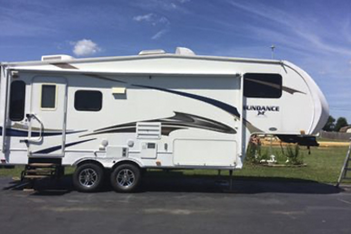 The LaValley family Testimonial Image with RV