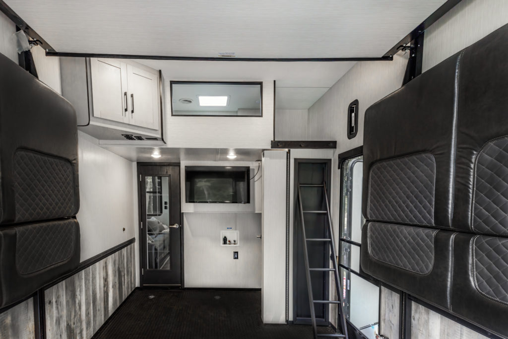 A view inside a toy hauler garage space without toys inside.