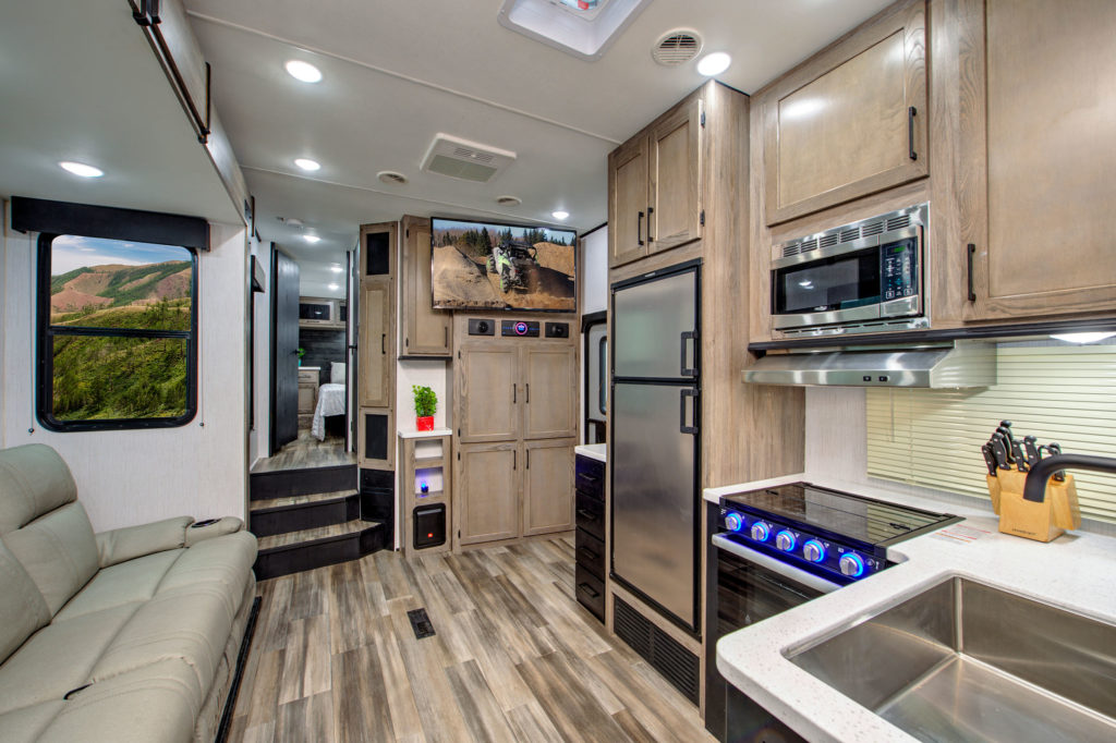 Highlighting RV living area interior inside Gravity 3210