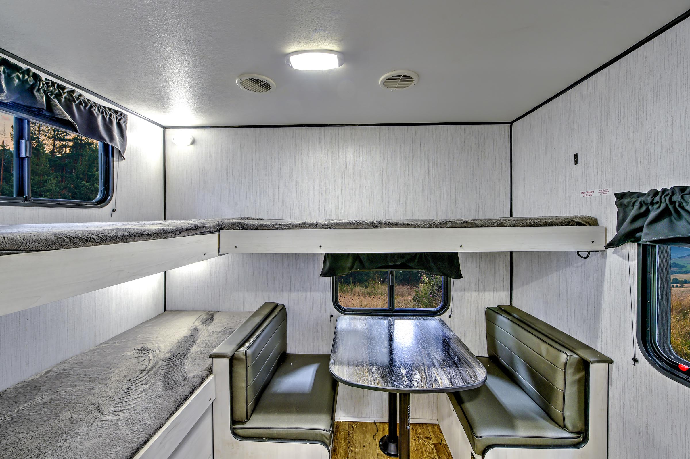 Remote work made easy with a bunkhouse with dinette.