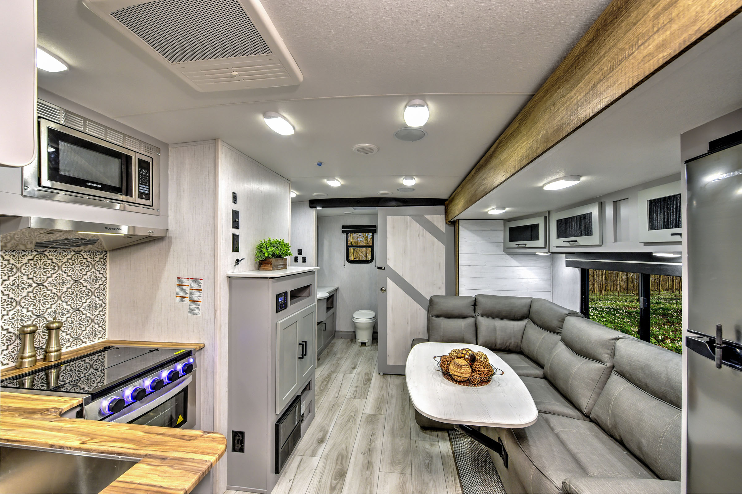 Work remote in comfort with a over-stuffed couch and coffee table.