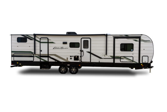 A white travel trailer with green and black stripes, two axles, multiple windows, and an entry door, shown from the side on a white background.