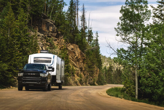 Exterior view of the 2024 Heartland Cyclone 4008 Fifth Wheel Toy Hauler, showcasing its sleek design, large slide-out, and modern RV features.