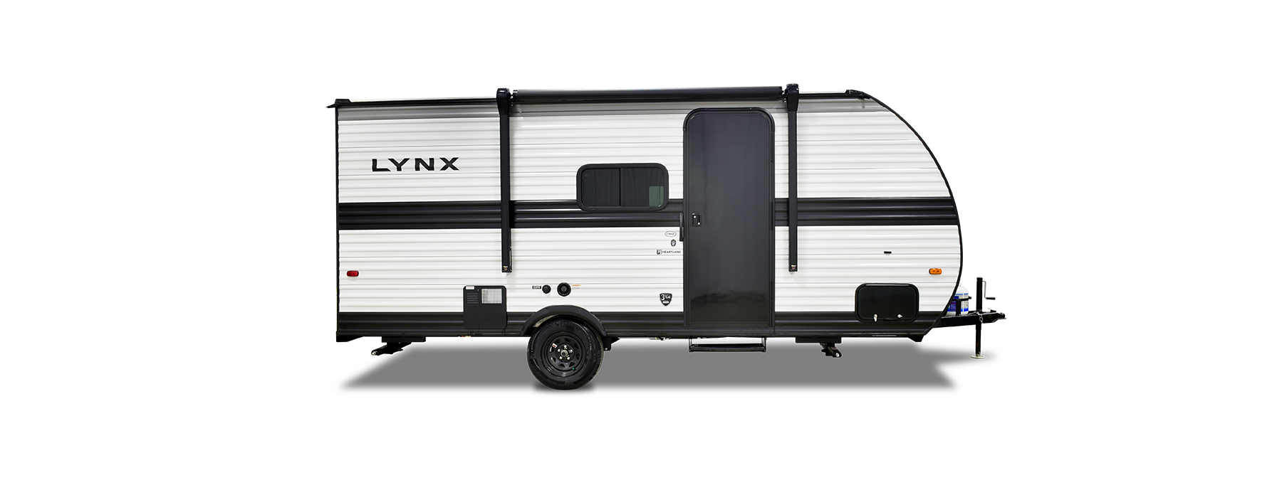 The image showcases a Heartland RV with a modern, sleek exterior designed for both style and durability. The RV features an aerodynamic front cap, bold graphic accents, and large tinted windows that provide a great view while maintaining privacy. A power awning extends from the side, offering an excellent outdoor living space. The sturdy entry steps make access easy, while the dual-axle setup ensures smooth towing. At the front, a power tongue jack and propane tanks add convenience for quick setup. The design focuses on blending functionality with aesthetics, making this RV a perfect companion for adventurous road trips.
