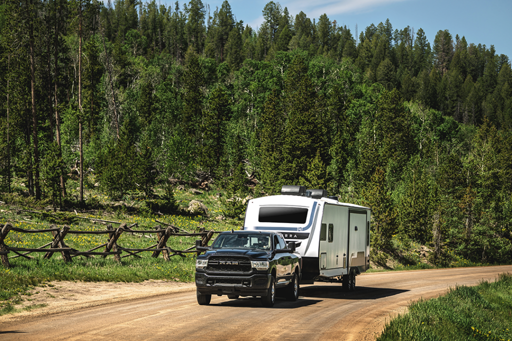 Half-ton truck with a towable travel trailer.